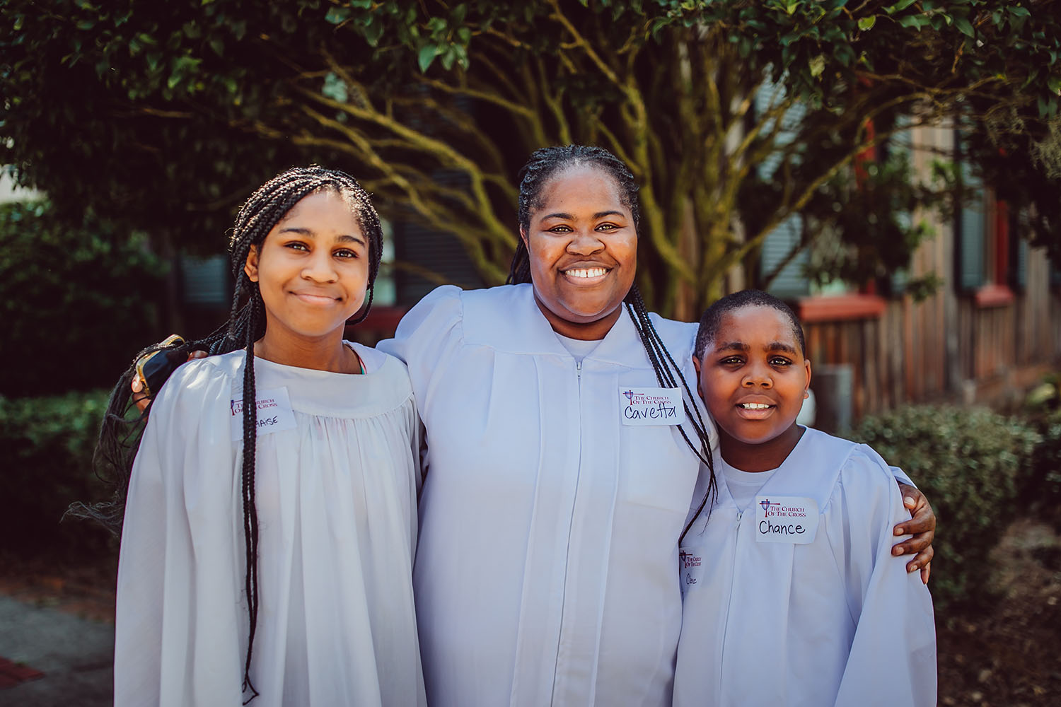 Members of the Church of the Cross posing in front of the Historic Campus