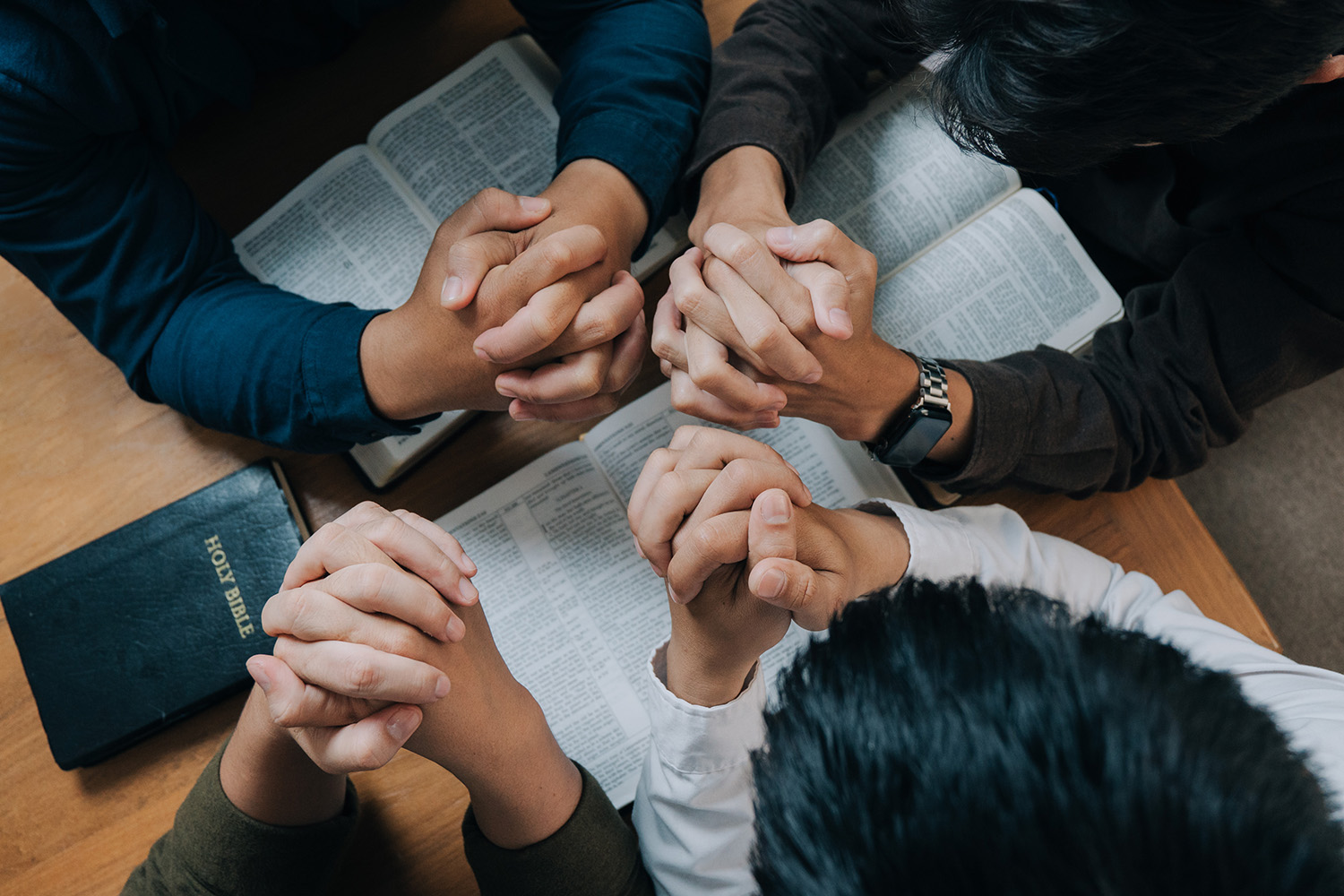 Members of The Church of The Cross fulfilling prayer request by praying