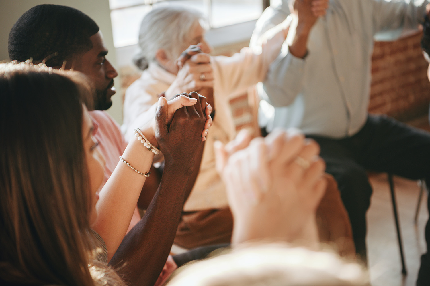 Members of The Church of The Cross fulfilling prayer request by praying